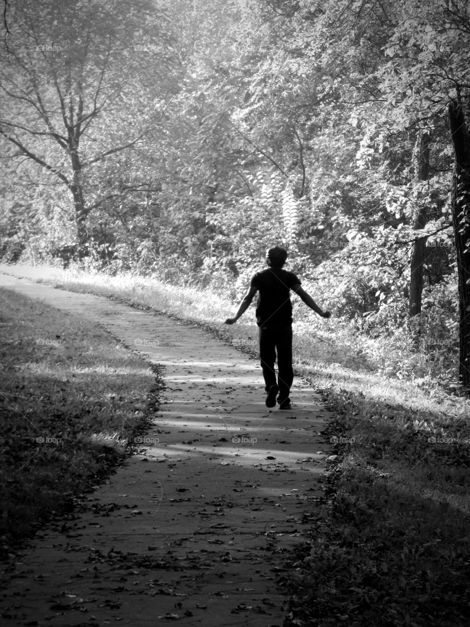 Walking boy in black and white 