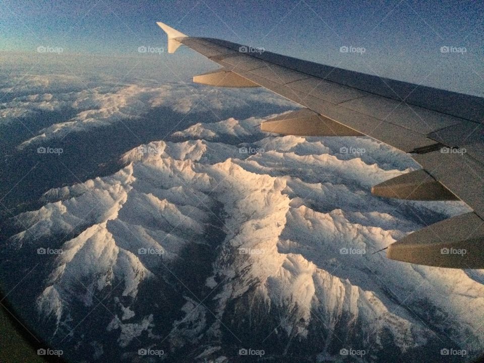 Flying over the snowy Alpes 