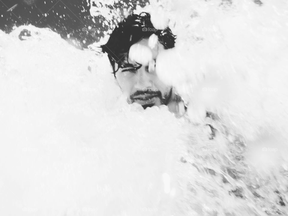 Man swimming in under sea