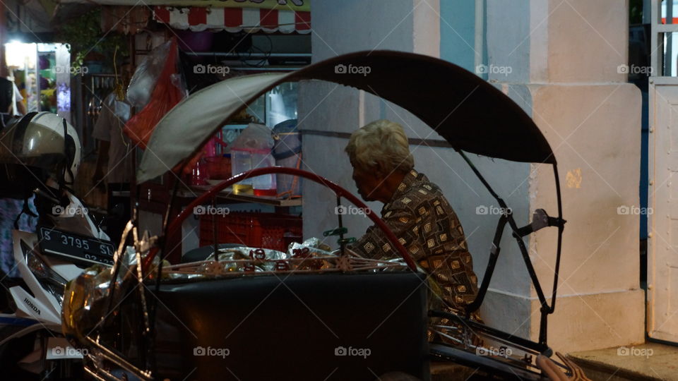 pedicab drivers waiting for passengers