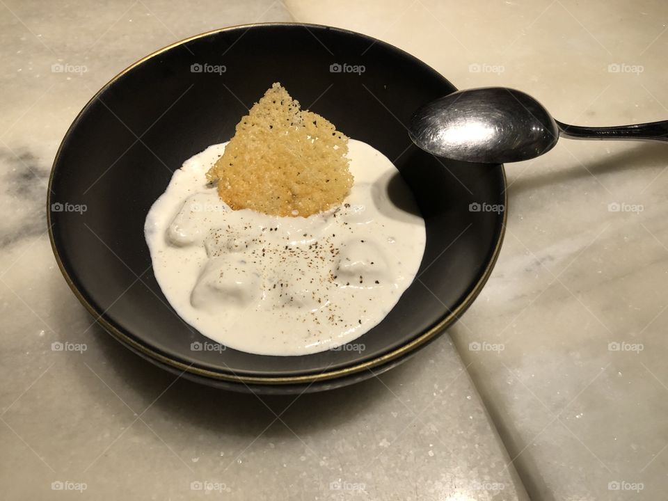 Delicious gnocchi in a blue cheese sauce and a crispy parmesan