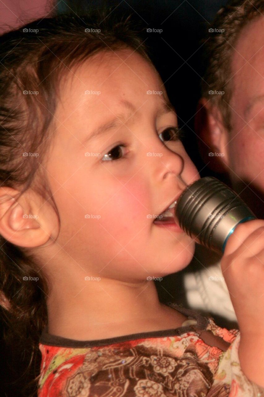 Singing her longs out :)