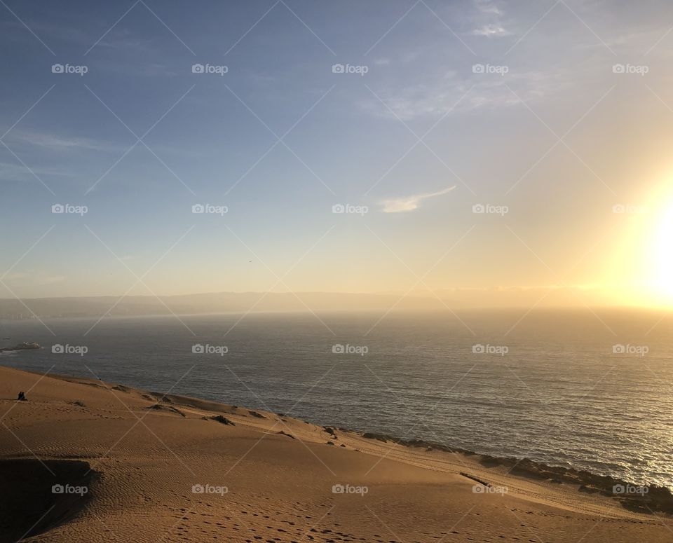 View from the dunes of the Sunset on the ocean 