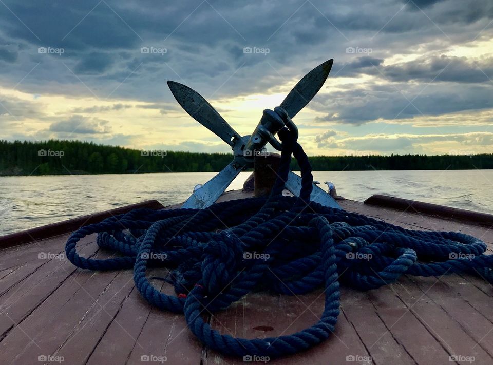 Anchor and rope on boats deck