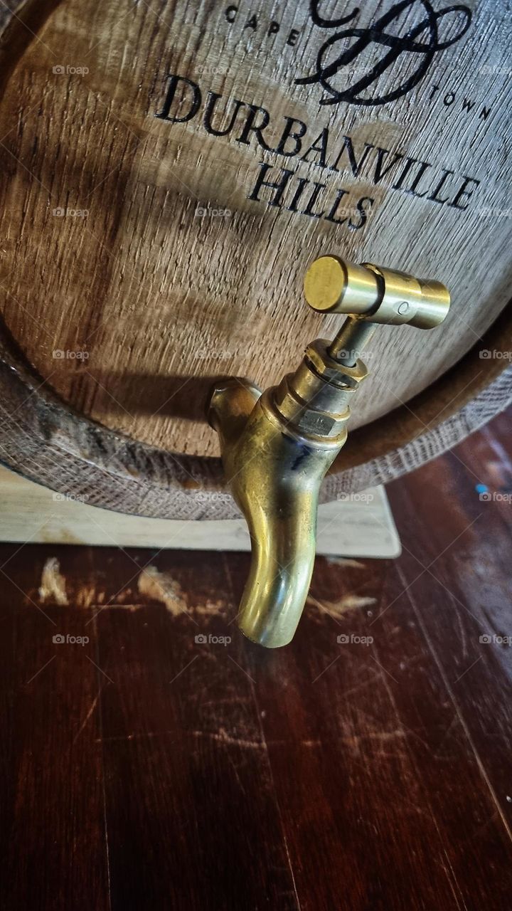 Wood and metal wine barrel