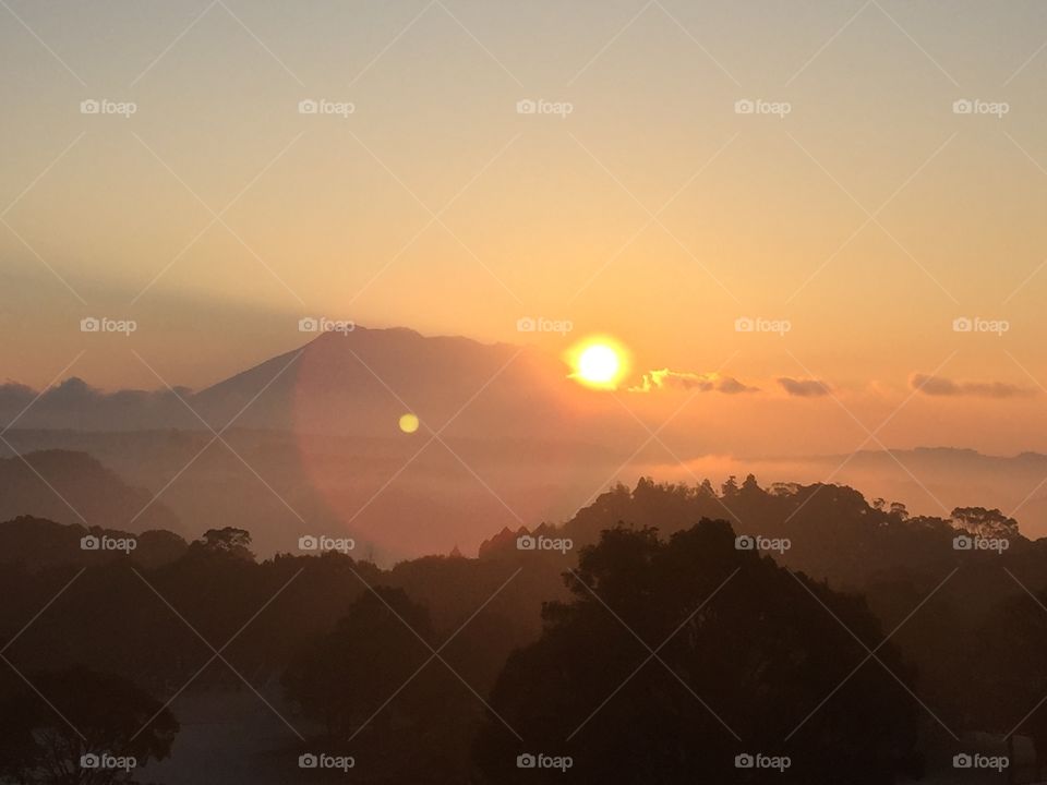 First sunrise over sakurajima volcano