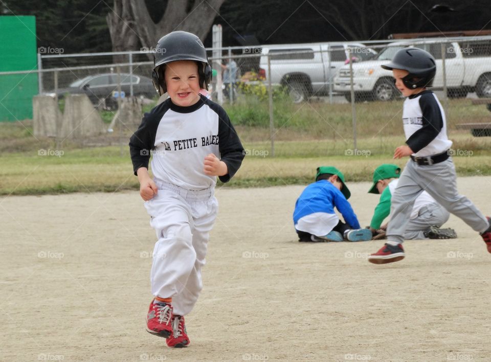 Little League Baseball. Young Kids Playing Baseball
