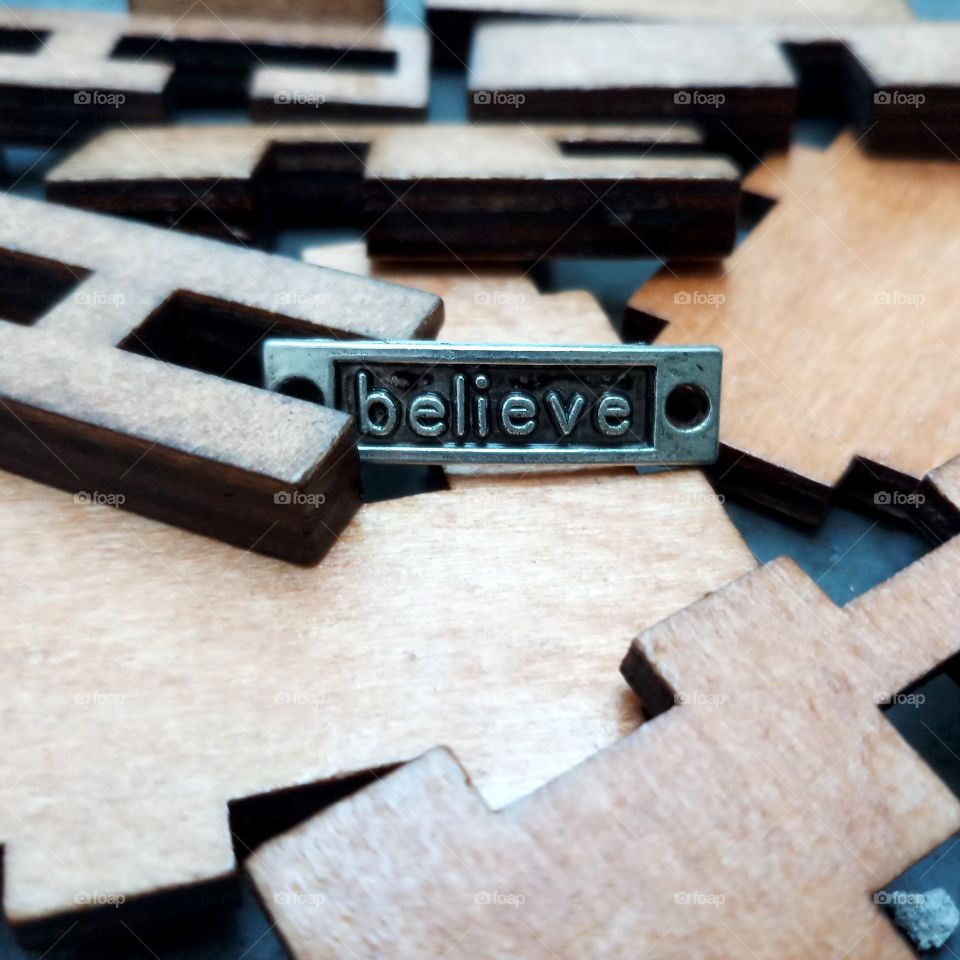 BELIEVE - the word of believe on the wooden cube puzzle