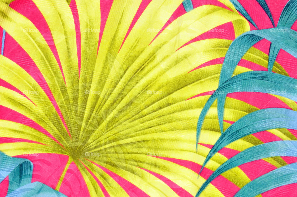 Colorful tropical graphic image of palm leaves. 