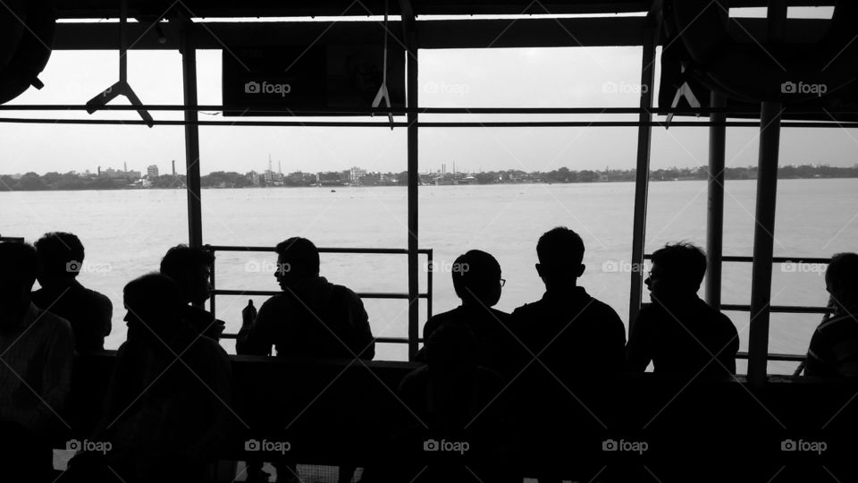 Tried to capture the busy life with full of Emptyness.Group of people busy talking, whereas the calm river watching it silently. Sometimes we get so busy with our daily life we do not take ta steps and time necessary to be introspective.