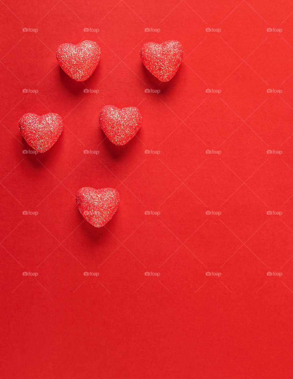 Red hearts on a red background. Valentine's Day. Postcard. Red pepper.