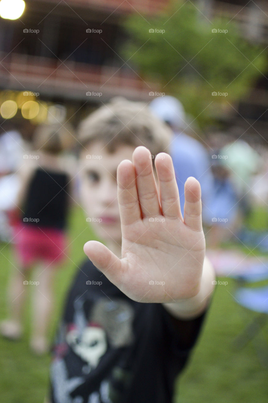 Close-up of a boy gesturing