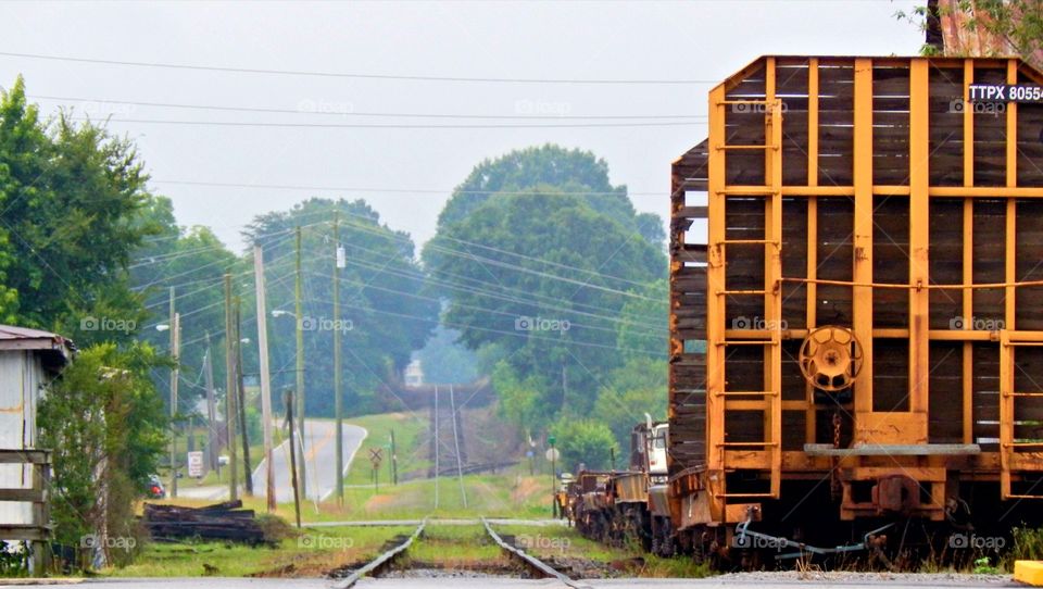 Railcar and distant view of railroad in Lavonia Georgia