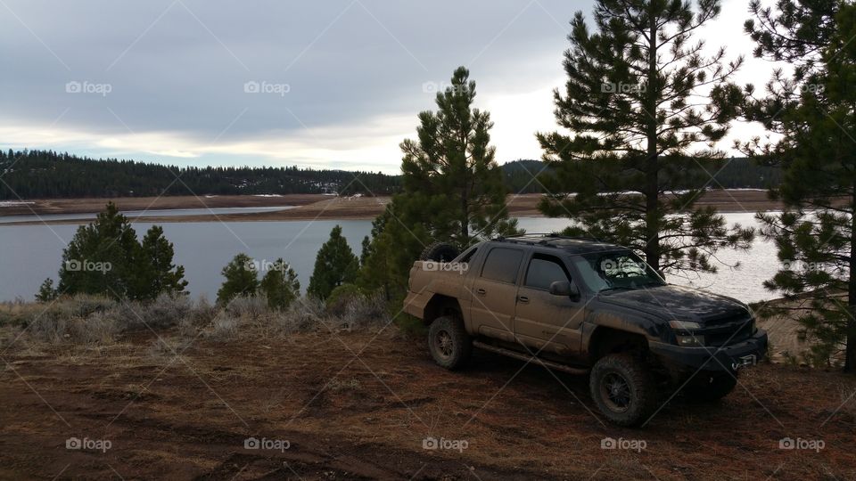Offloading near the lake. just a fun day at the lake getting some mud on the tires