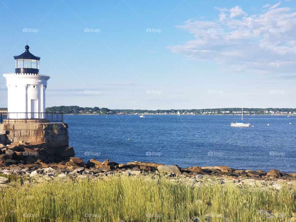 Gorgeous lighthouse and ocean scene + boats at Bug Light Park in South Portland,  Maine