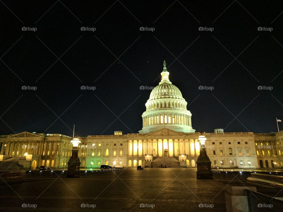 The east front of the United States Capitol is seen at night. (Image source: Jon Street Media)
