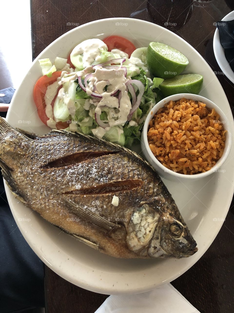 Delicious Fried fish with rice and salad 