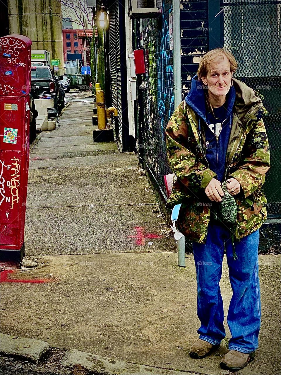 My partner in life, Timothy waits for me to cross over the train tracks so we can venture to the waterfront, climb over the wall and onto a set of large wooden planks and down a ladder that takes us to our boat “Salvation”. 2023. Hypnotic Productions