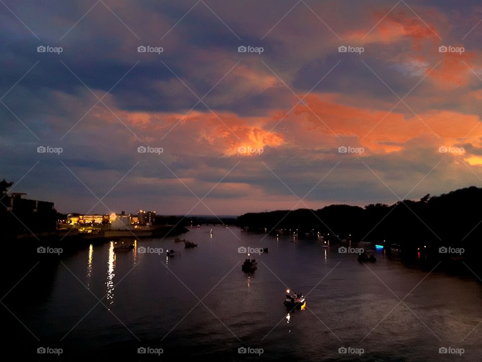 Boats on the river at dusk