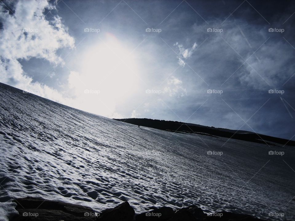 Snowy mountain slope