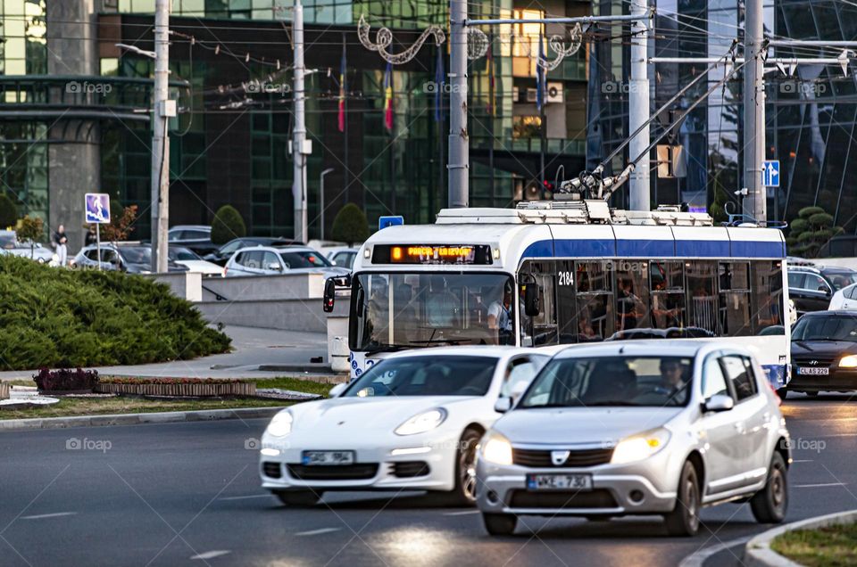 Trolleybus in traffic, blurred motion. Efficiency and environmental friendliness of transport.