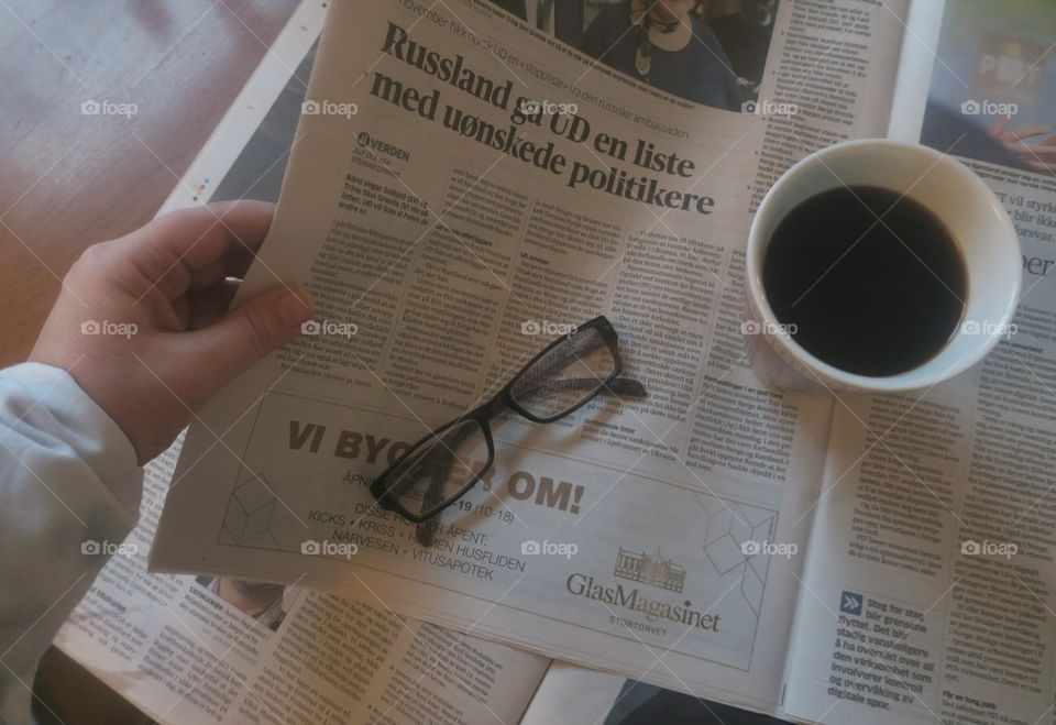 Reading the newspaper