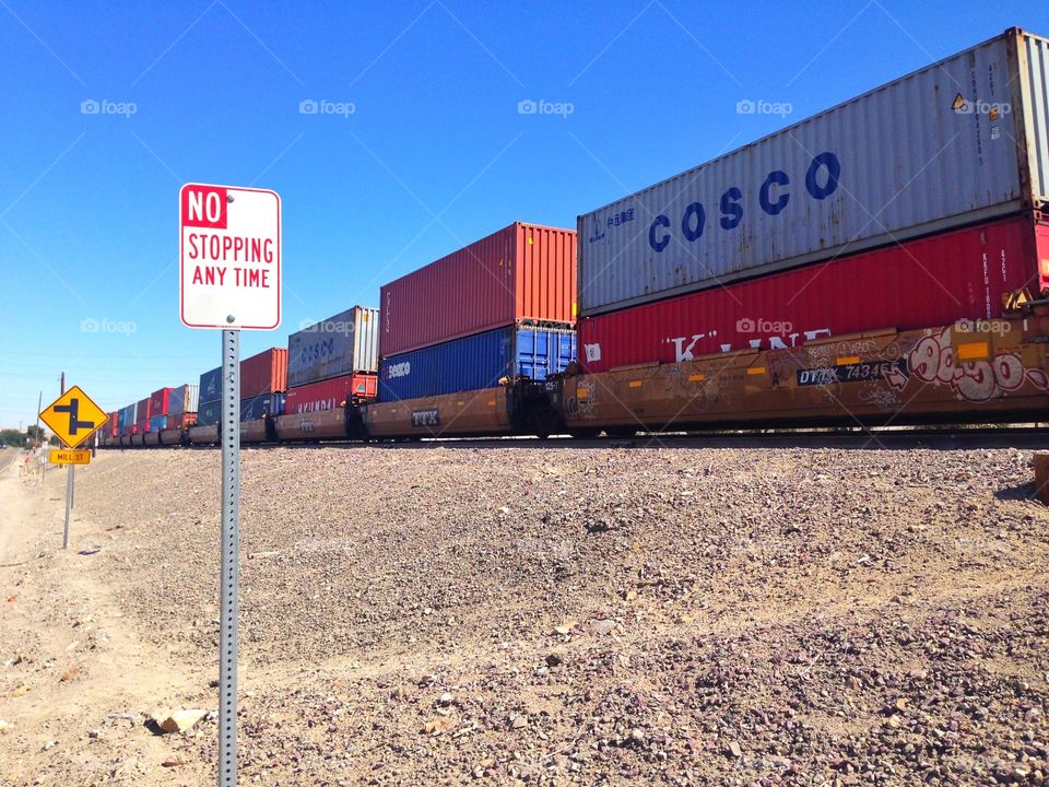 Colored freight train. Colored freight train in the desert