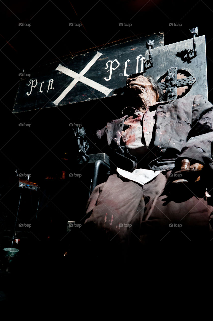 Monster sitting on chair