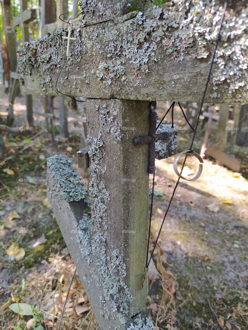 Broken ring on crucifix