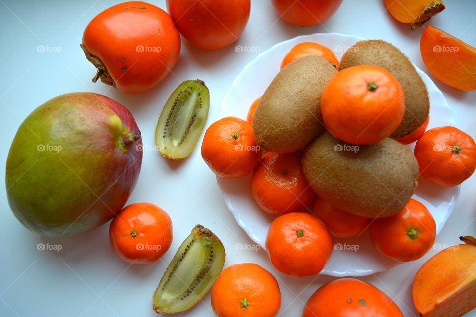 fresh tropics fruits top view white  background