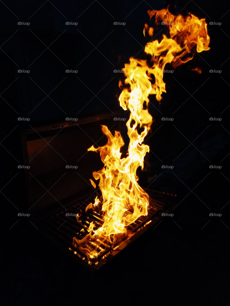 Fire flames on bbq grill