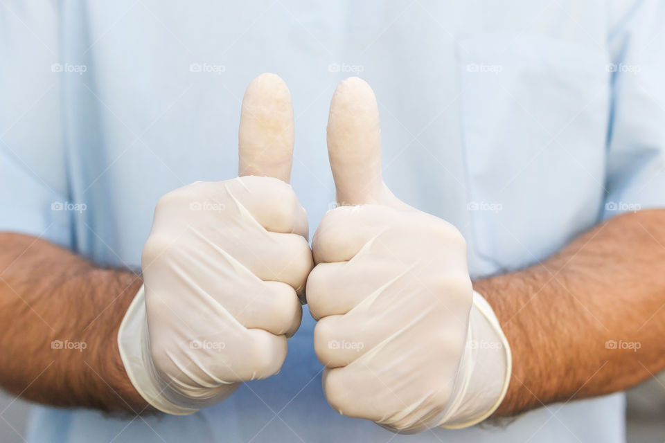 thumps up, medical gloves