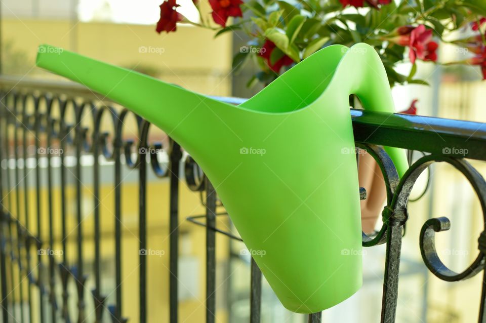 Green watering can