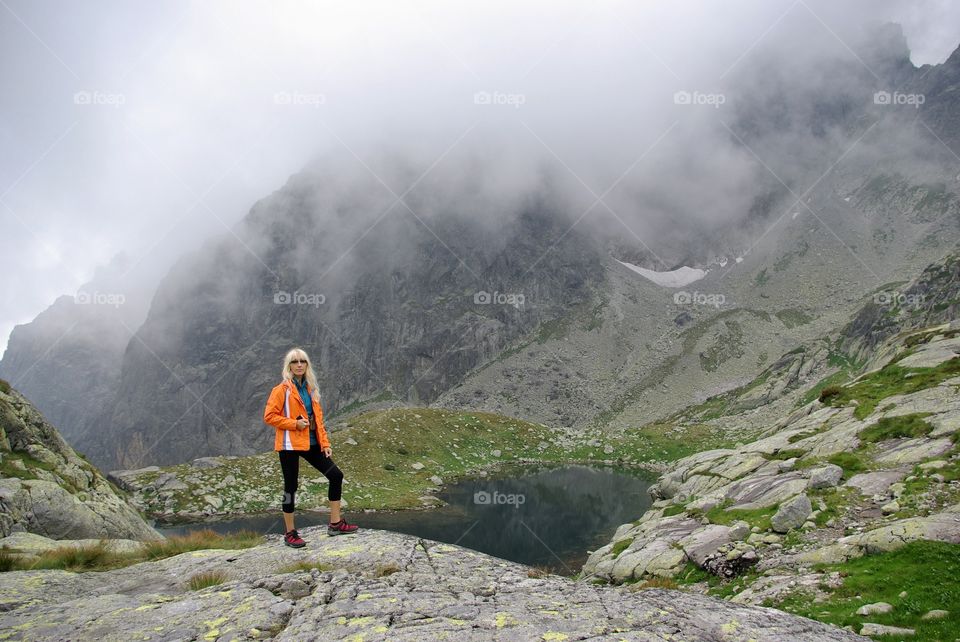 Young woman standing on mountain