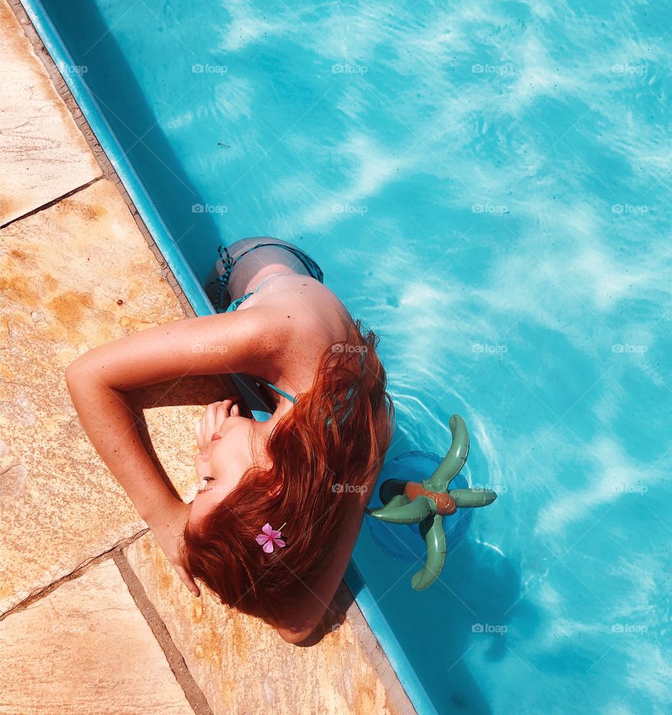 Girl ginger summer pool party