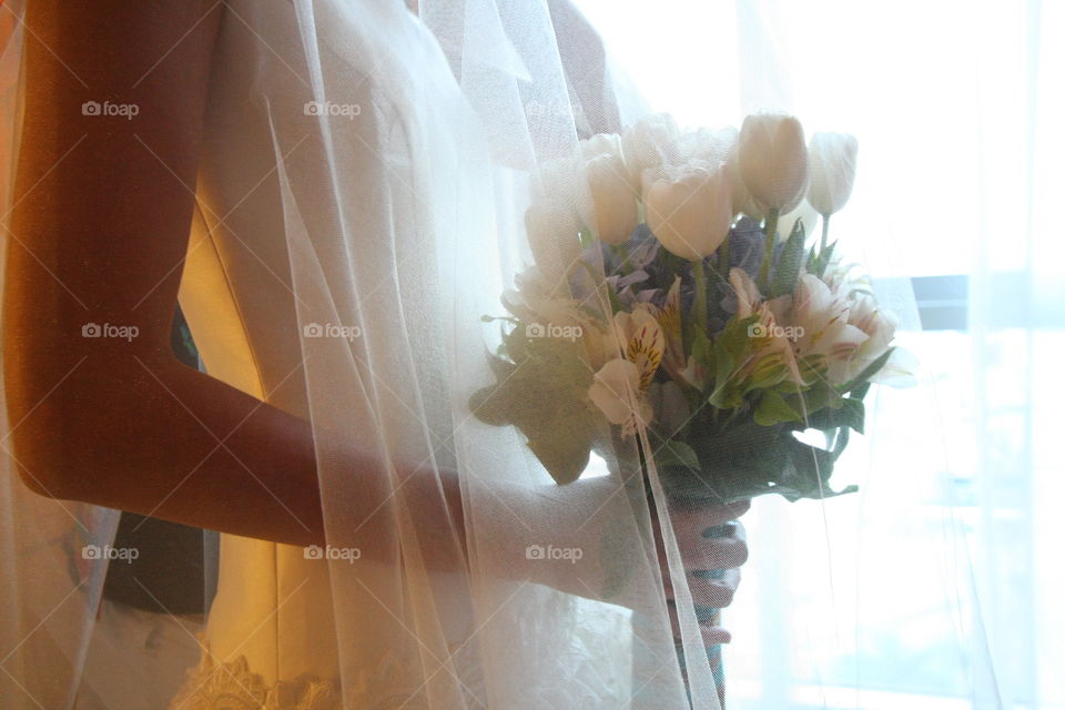 bride with boquet of flowers