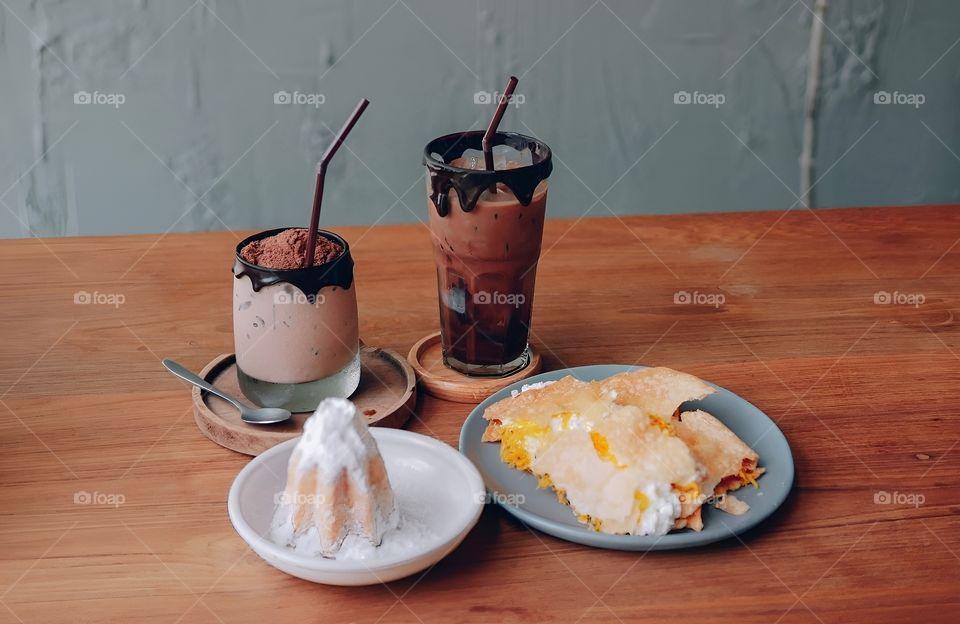 Snacks and fresh milk roti with drink
