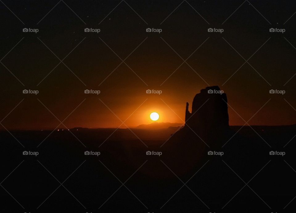 Moon rising at Monument Valley