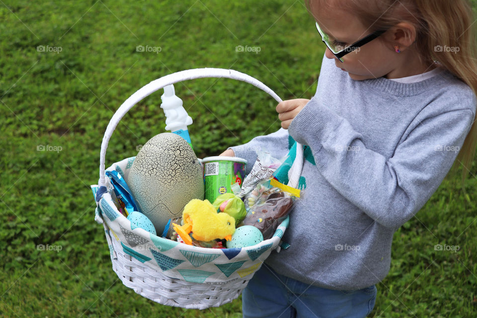 Child holding a Easter basket