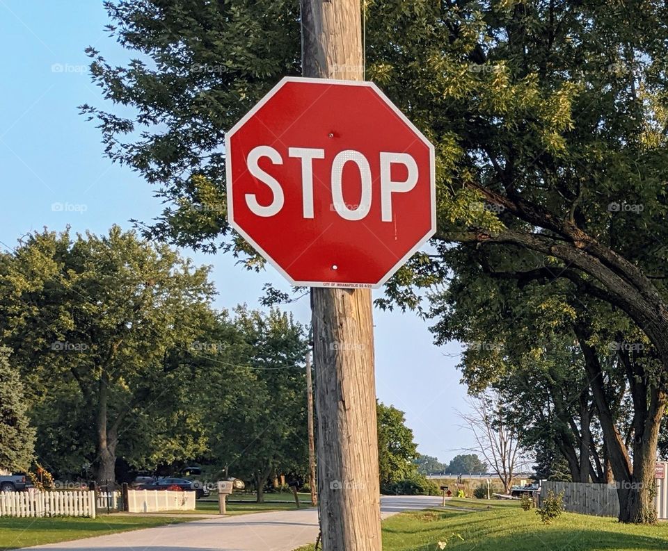 red stop sign at intersection