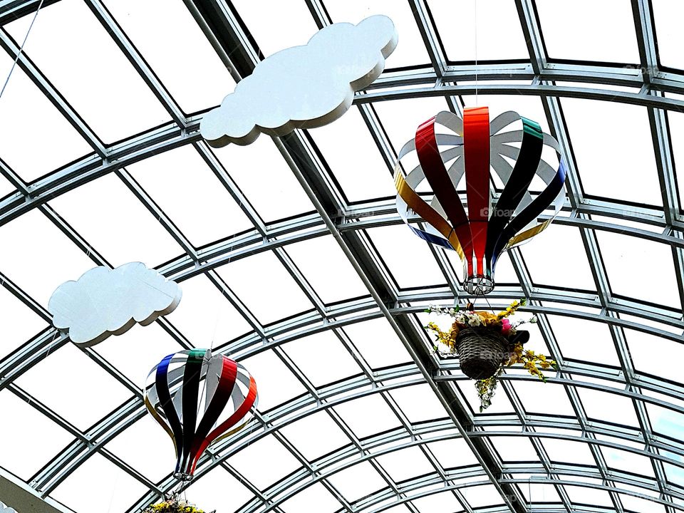 clouds and air balloons under roof