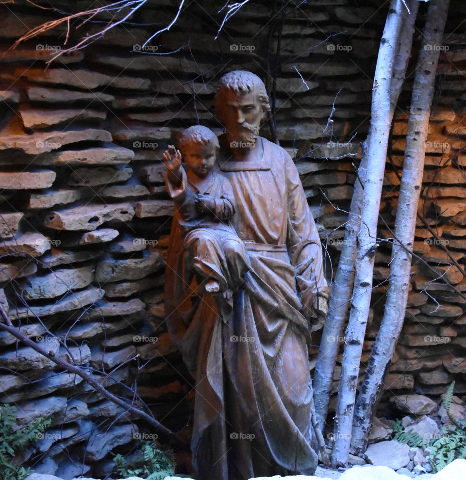 Statue at house on the rock