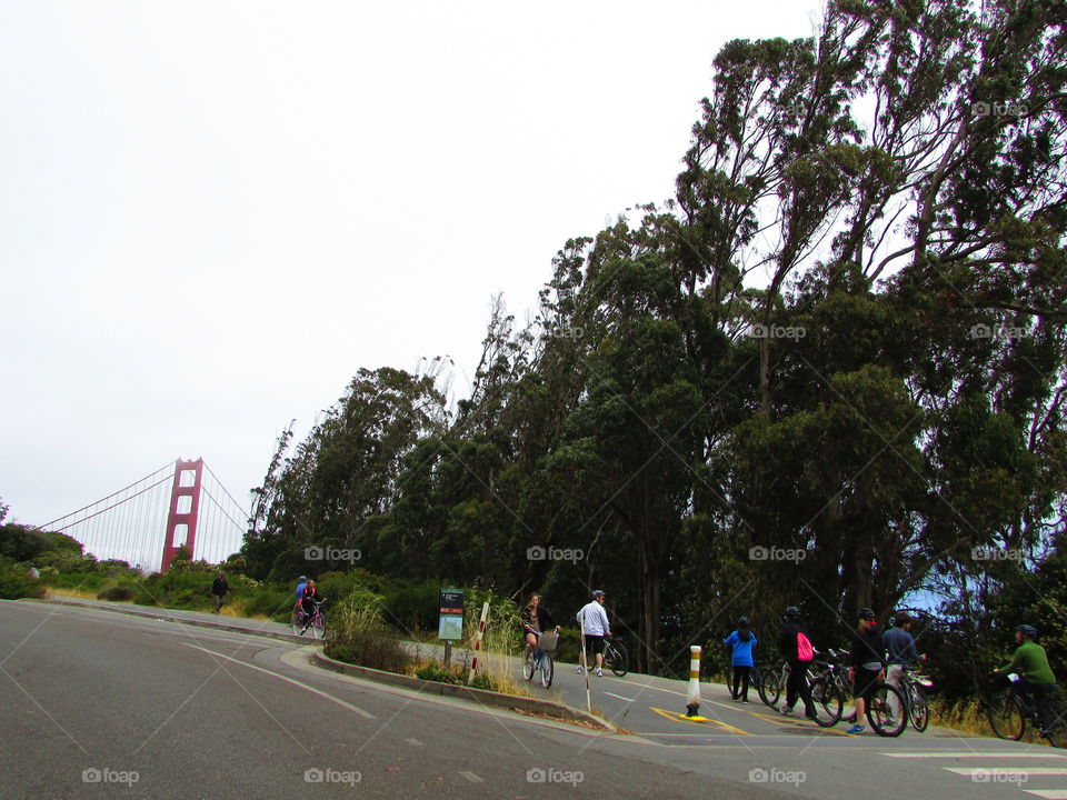 Golden Gate Bridge, people on a hike in San Francisco California