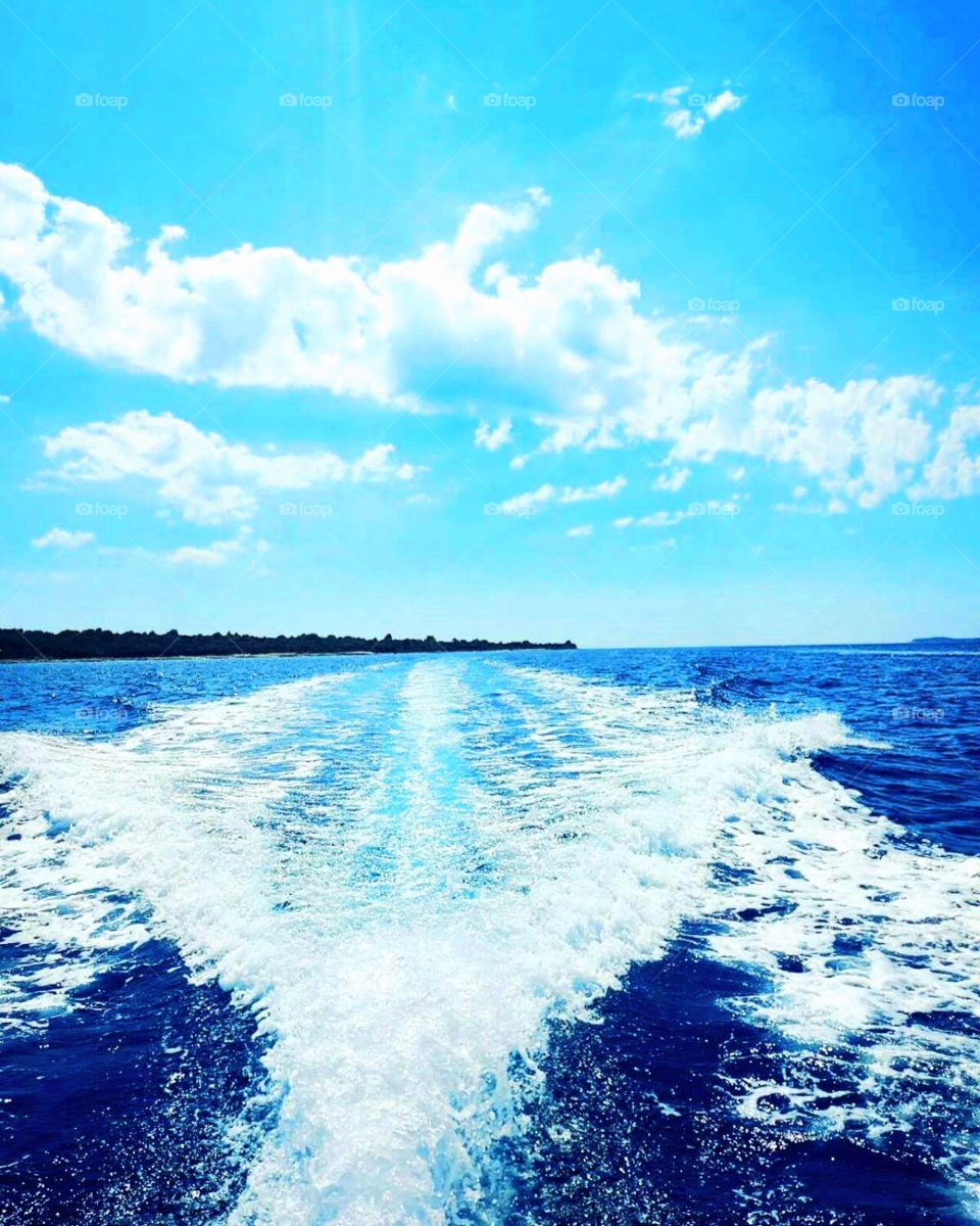 Sliding through blue waves