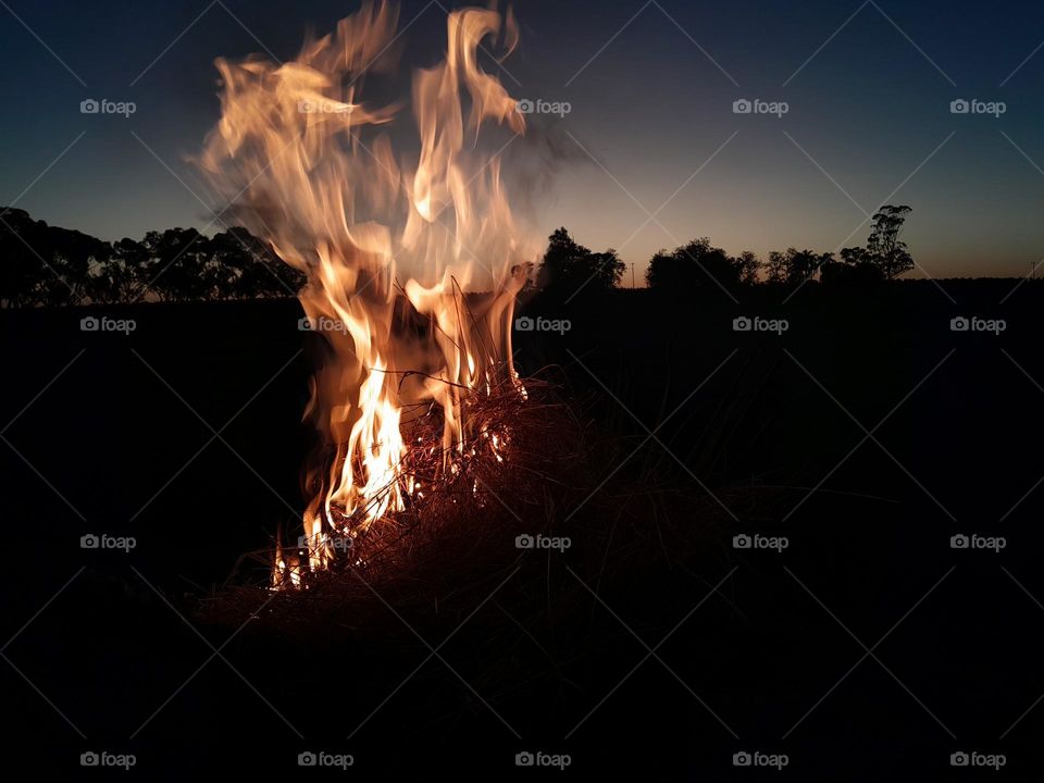 Flames before daylight