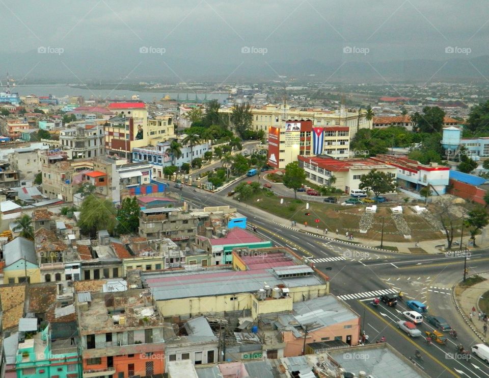 Rural vs Urban living. Santiago de Cuba - Tall buildings are the major landscapes in this capital city. Urban areas are large areas that consists of both living and working areas with high population
