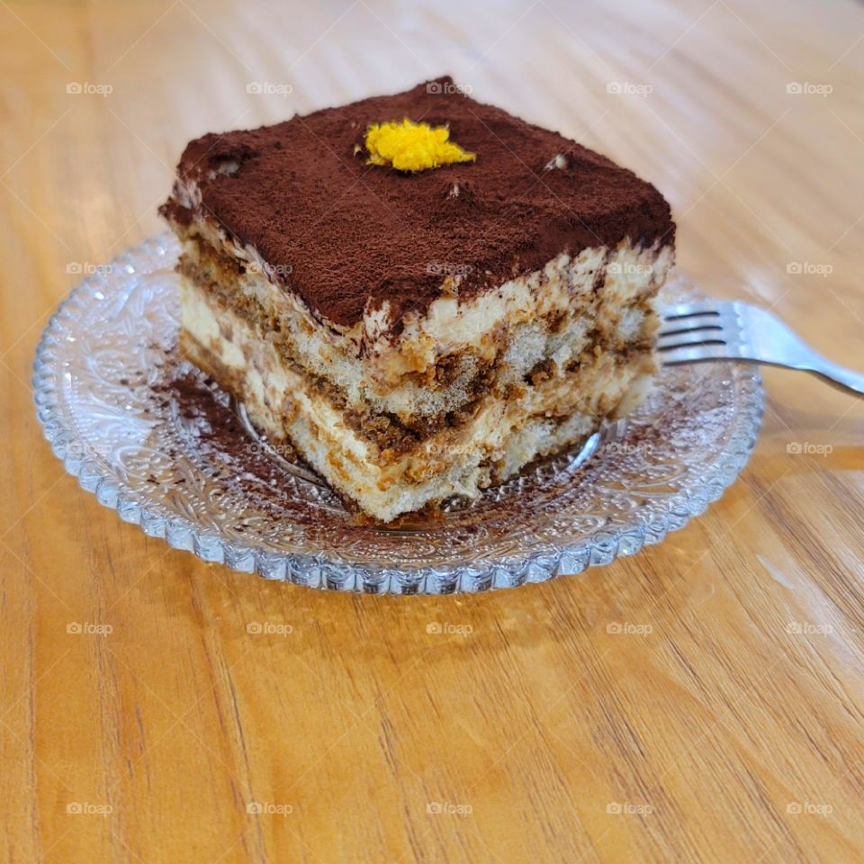 tiramisu on glass plate.Tiramisu in a glass dish