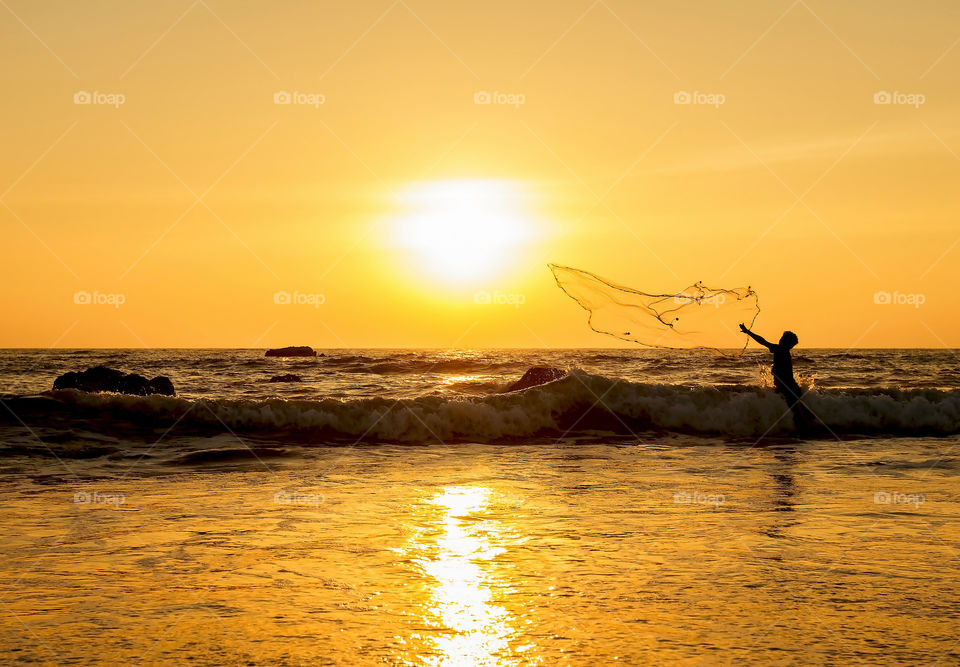 Fishing at sunset