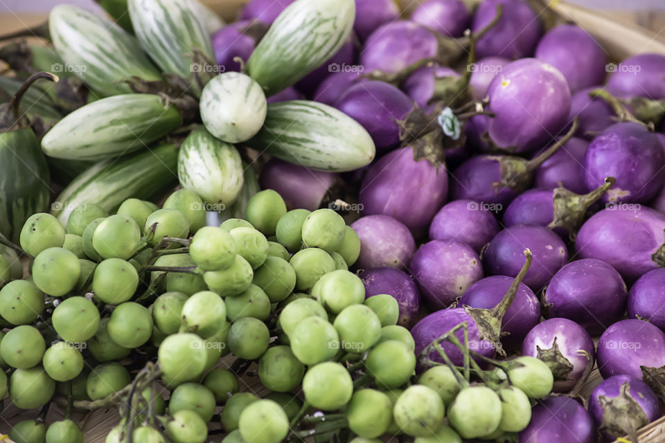 Purple Eggplant and Eggplant , Vegetables in bamboo baskets.