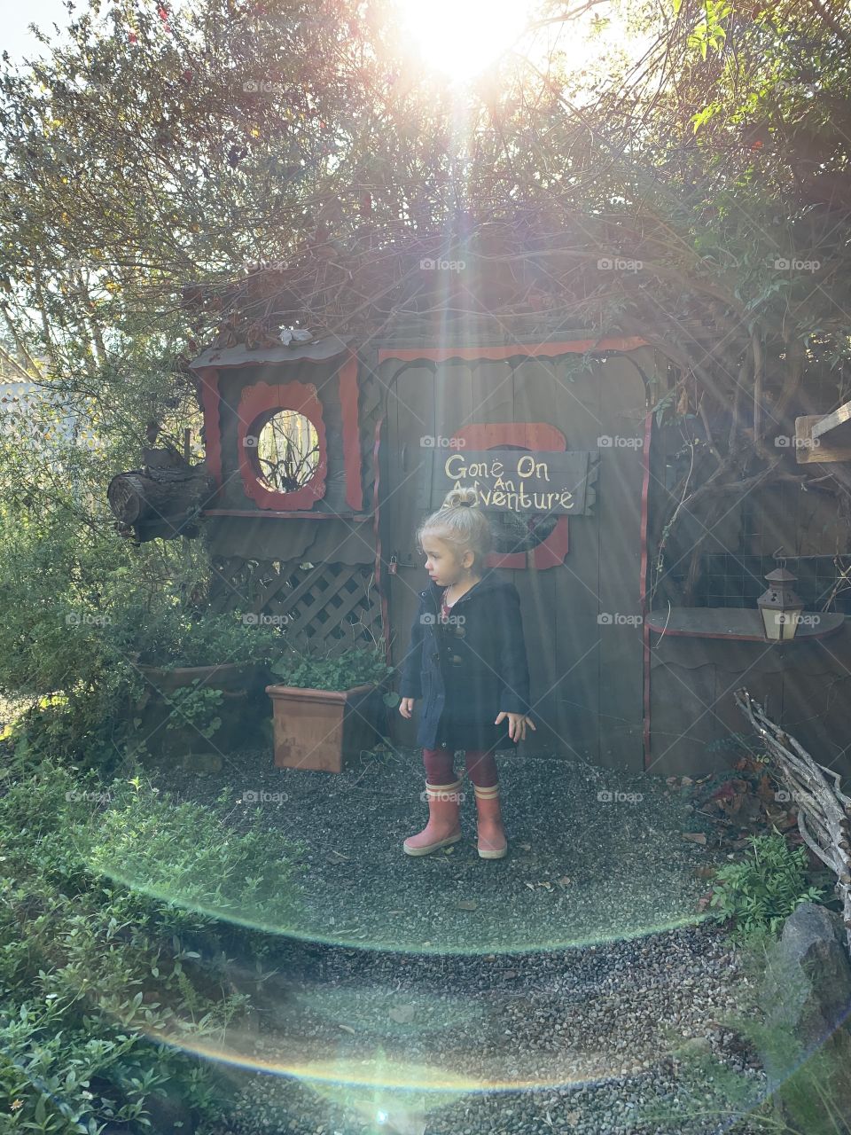 Girl in an enchanted garden in Cambria, CA.